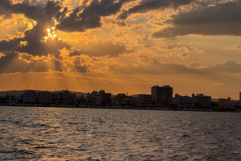 sunset over Mackenzie Beach Larnaca, Cyprus sunset over Mackenzie Beach Larnaca Cyprus