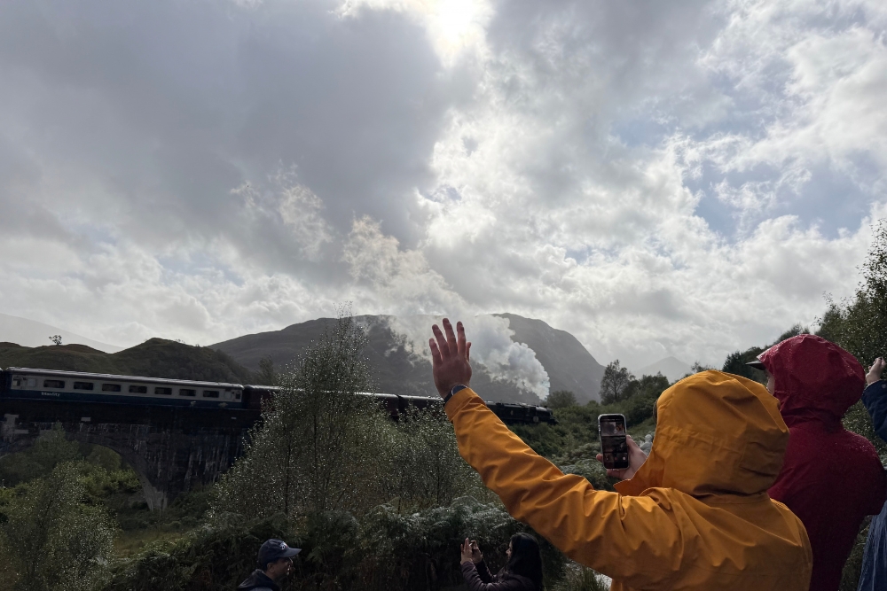 Waving at Hogwarts Express at Glenfinnan Viaduct Scotland